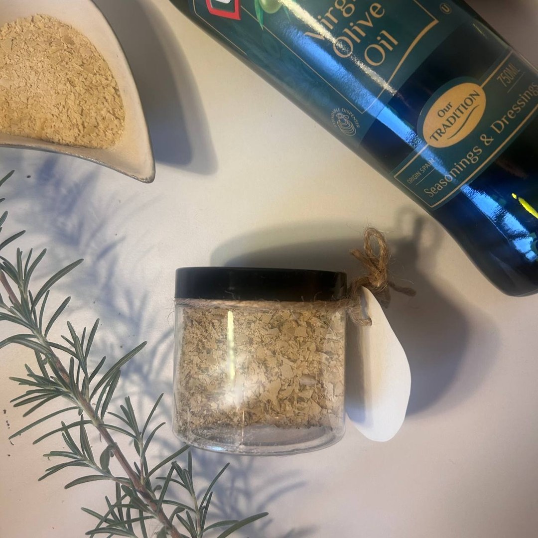 jao: the jar with olive oil and a rosemary sprig